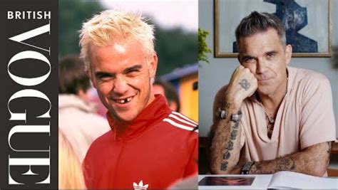 Robbie Williams Breaks Down 18 Memorable Looks From 1990 